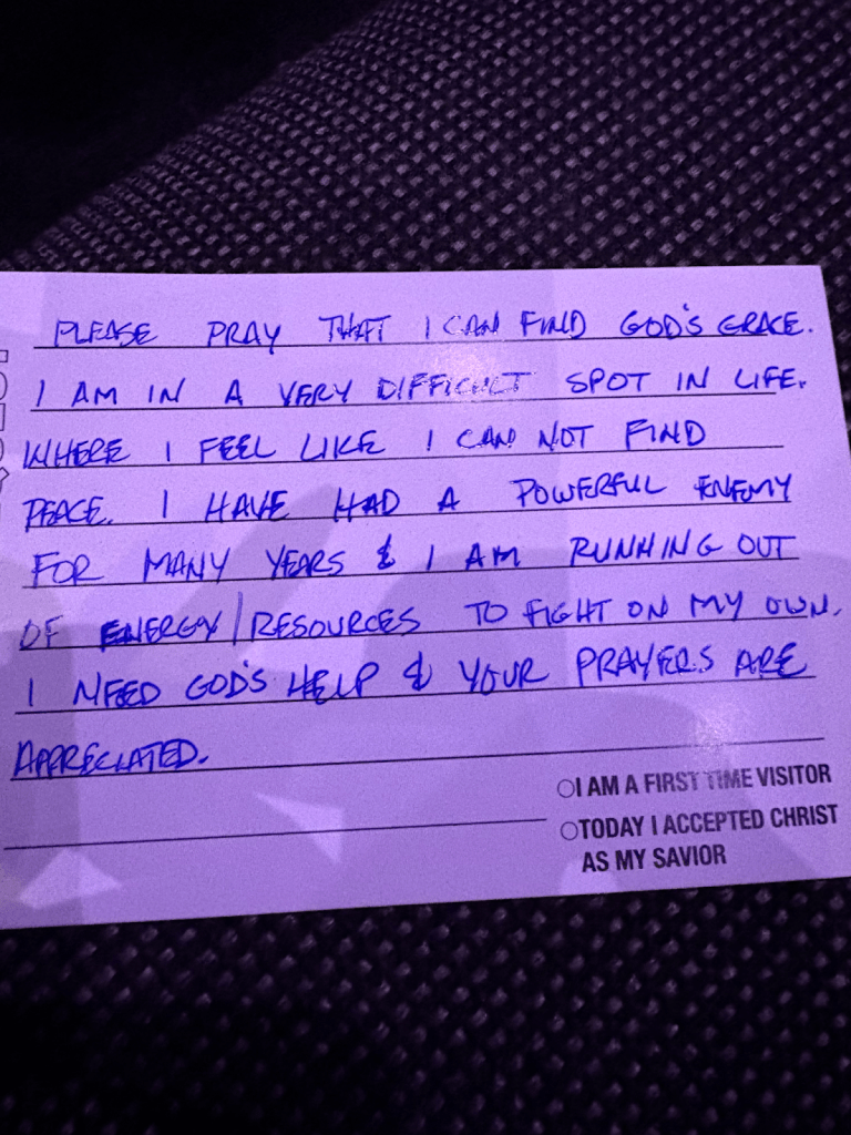 A handwritten prayer request card expressing the need for God's grace and help during a difficult time in life.